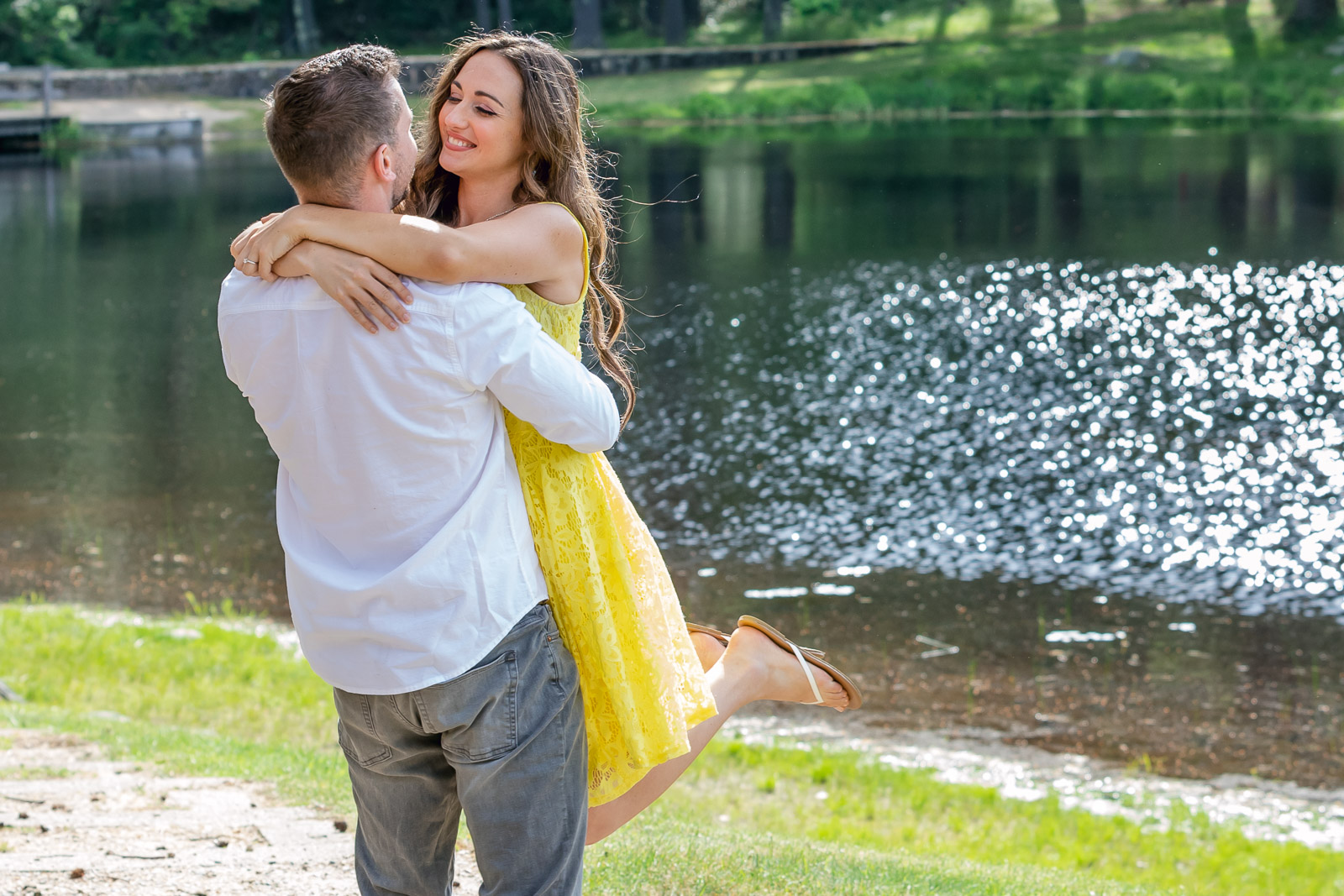 playful engagement photo shoot with bold colors at a RI park