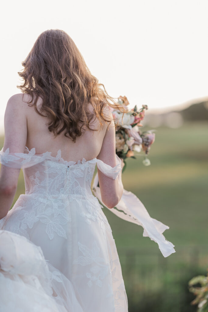 Harkness Memorial State Park CT Wedding at Eiola Mansion Bride in the wind