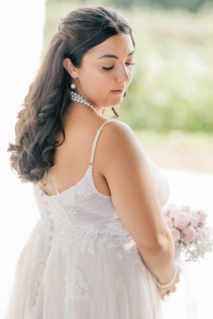 natural portrait of a bride before an intimate wedding ceremony at Barden Family Orchard